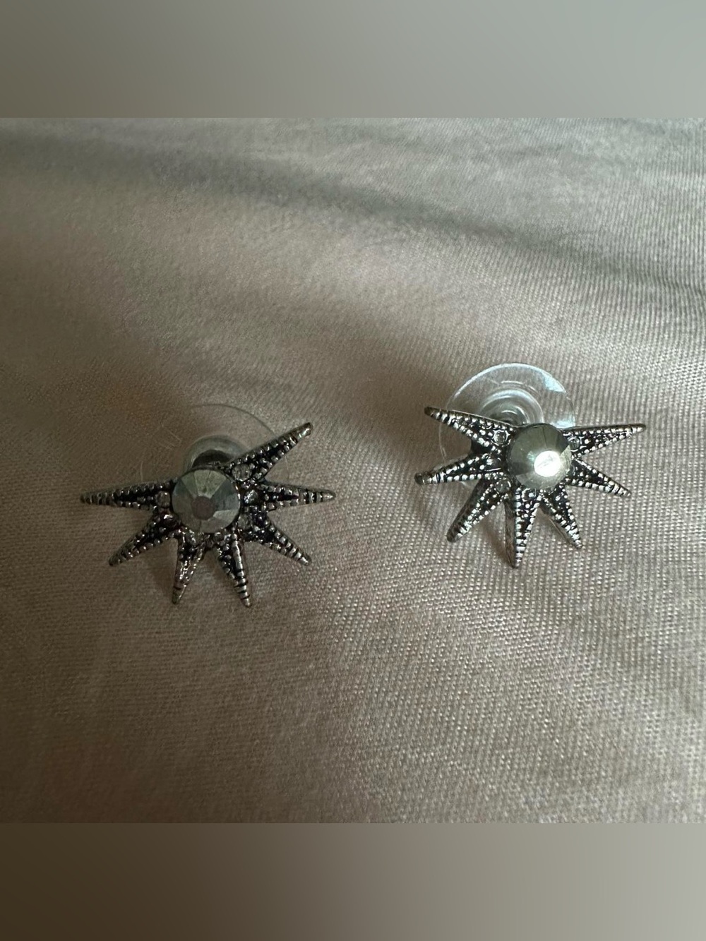 Vintage Silver tone half star rhinestone earrings.